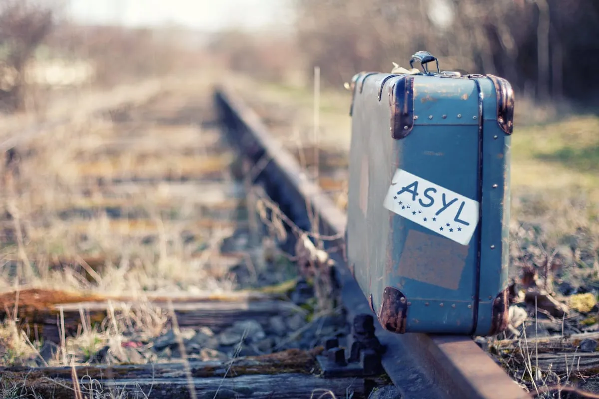 Merkel verteidigt Mehrausgaben für Flüchtlinge