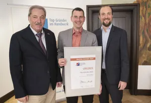 Preisverleihung an Markus Mack (Mitte)